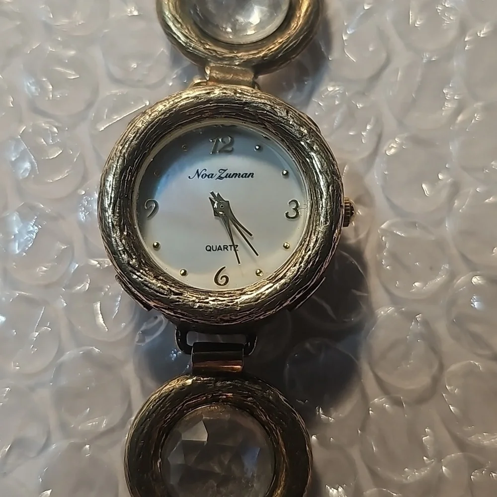 Zuman gold tone